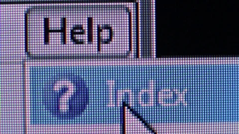 White cursor presses the help button on a black background Stock Footage 74250090