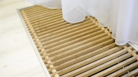 A white curtain flies in the wind. Ventilation and floor heating near the bal Stock Footage 155985260