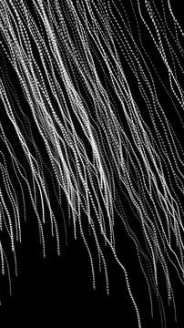 White dashed lines of lights on a black background Stock Photos