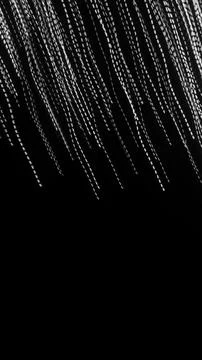 White dashed lines of lights on a black background Foto stock