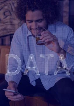 White data text against man with phone drinking and purple overlay 写真素材