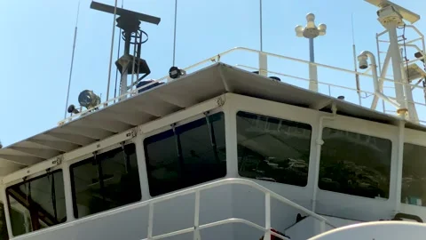 White Deckhouse with Blue Sky Background. 4k. Slow Motion. Stock Footage 157748707