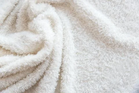 White delicate soft  background of plush fabric Stock Photos