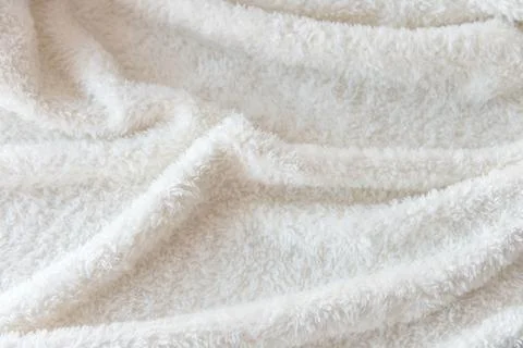 White delicate soft  background of plush fabric Stock Photos
