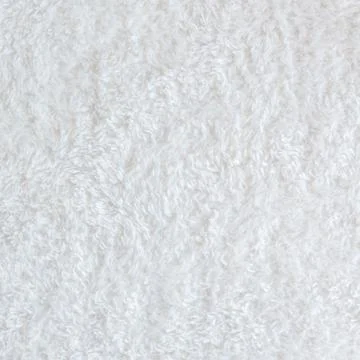 White delicate soft  background of plush fabric Stock Photos