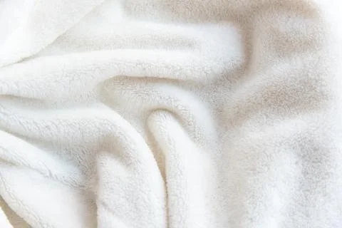White delicate soft  background of plush fabric Stock Photos