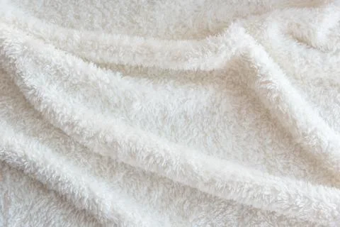 White delicate soft  background of plush fabric Stock Photos