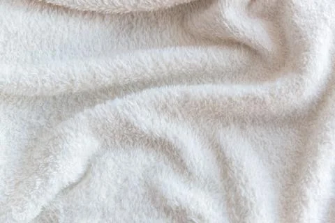 White delicate soft  background of plush fabric Stock Photos