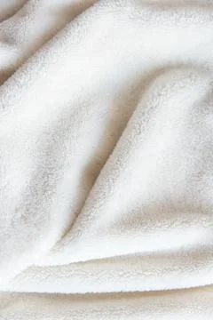 White delicate soft  background of plush fabric Stock Photos