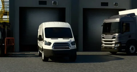 White delivery van parked in front of warehouse rolling doors Видео 330007842