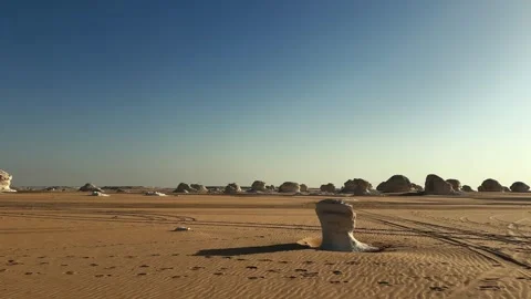 White Desert landscape viewed from moving vehicle window at sunset 스톡 동영상 340867411