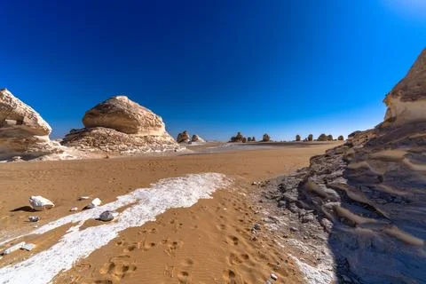 White Desert pathway between rocks in Giza, Egypt Stock Photos