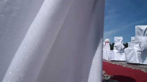 White design wedding ceremony, a red carpet. A bright Sunny day, blue sky. Stock Footage 65331587