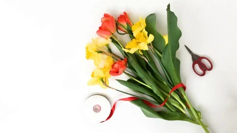 White desktop with spring flowers Stock Footage 128060536