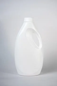 White detergent bottle on neutral background Stock Photos