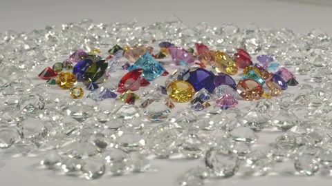 White diamonds set around various colored diamonds. Stock Footage 152928121