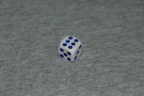 White dice with grey background Stock Photos