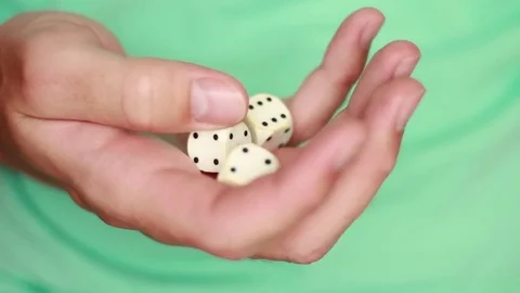 White dice in hand closeup 스톡 동영상 75827401