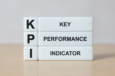 White dice with KPI (KEY, Performance and Indicator) word on table backgrou.. Stock Photos