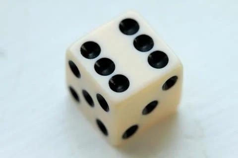 White dice wining six points Stock Photos