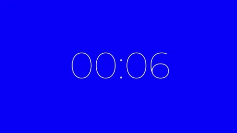 White digital timer counting down from 0:12 to 0:00 on blue background. Twelve Stock-Footage 317705908