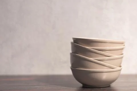 White dish on a dark background Stock Photos