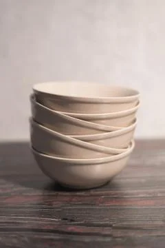 White dish on a dark background Stock Photos