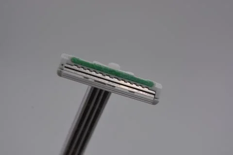 White disposable dlastic metal sharp razor set on white background. 写真素材