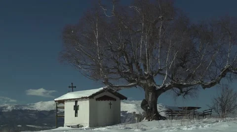 White Dog in the Snow Mountain Church 4K Stock Footage 59771798