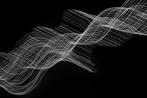 White dotted lines of lights on a black background Stock Photos