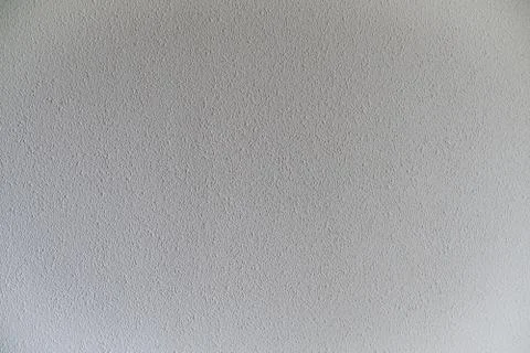 White dotted textured wall background Stock Photos