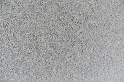 White dotted wall texture Stock Photos