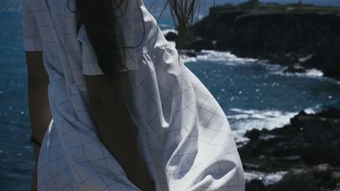 White dress in a square in the wind Stock-Footage 96006128
