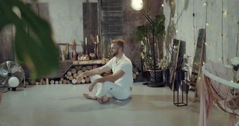 White dressed men is doing his morning exercises. Stock Footage 135635773