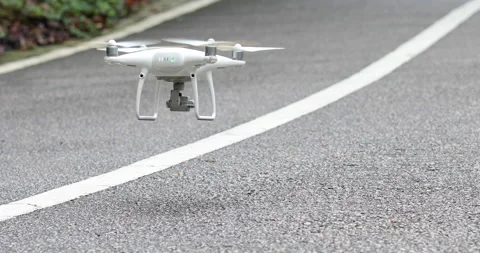 White drone with camera flying in tropical forest Video stock 132310389