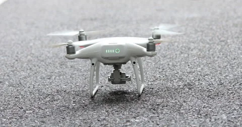 White drone with camera taking off on trail in tropical forest,with sound Stock Footage 132319069