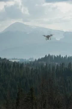 White drone in dark sky Stock Photos