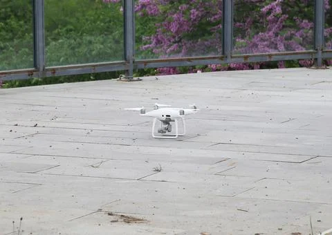 White drone flying on the ground Stock Photos