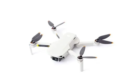 White drone with four propellers on a white background Stock Photos