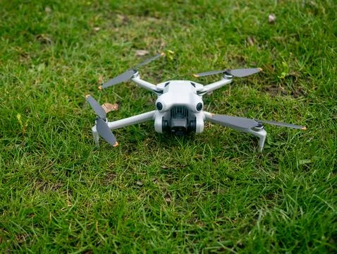 White drone is on the grass Stock Photos