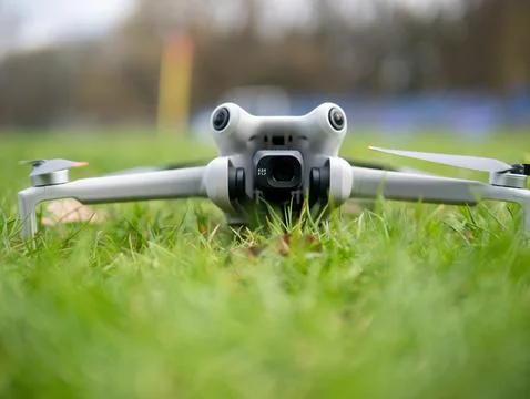 White drone is on the grass Stock Photos