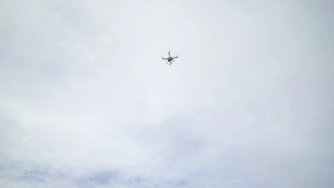 White drone landing by the seaside Stock Footage 83730440