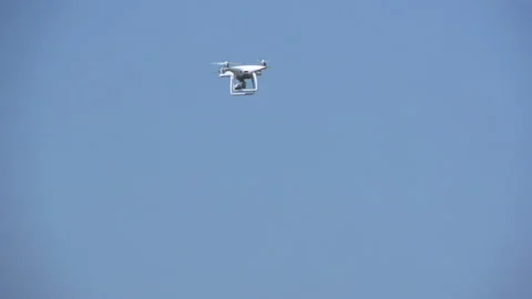 White drone, quadrocopter with photo camera flying concept Stock Footage 87646238
