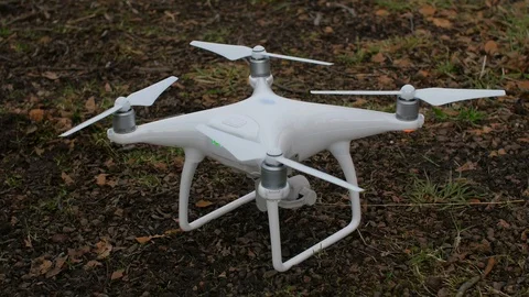 White drone takes off in the forest Stock Footage 87273737
