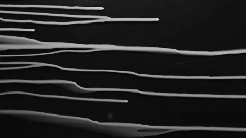 White Drops of rain trickling down on black background. Vídeo Stock 138540294