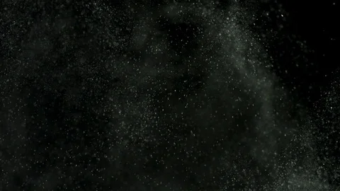 White dust debris exploading on black background, motion powder spray burst in Stock Footage 106437094