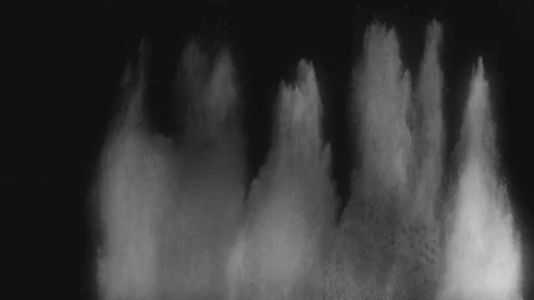 White Dust Flies Up Over Dark Background Stock Footage 76935071