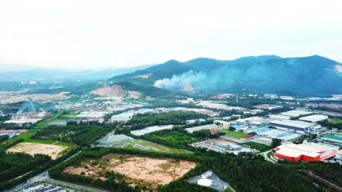 White dust from mountain blasting, aerial view in Negeri Sembilan, Malaysia Stock Footage 337417765