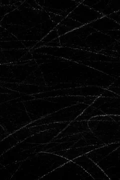 White dust particles and scratch lines on a black concrete wall surface for b Stock Photos