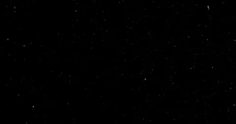White dust particles floating slowly in space on black background Stock Footage 112886125